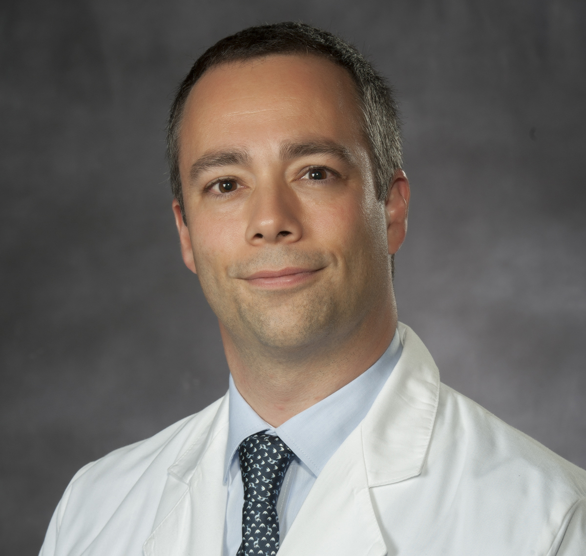 Dr. Oliver Karam