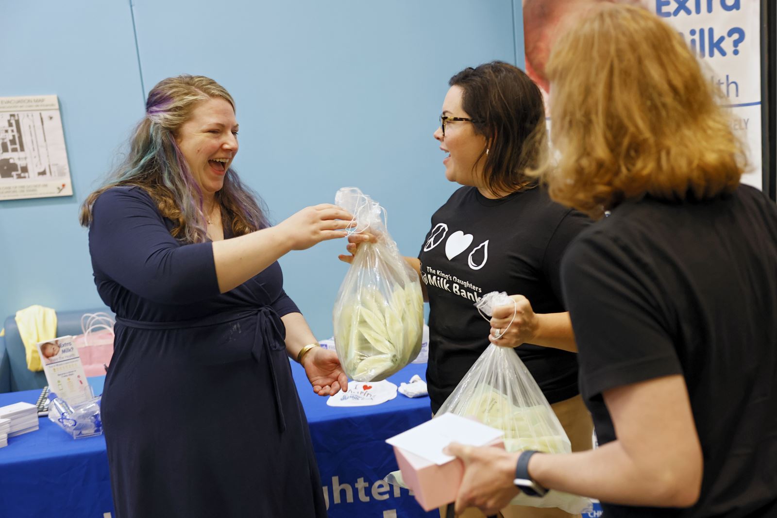 Donor drops off her donation to the breast milk drive