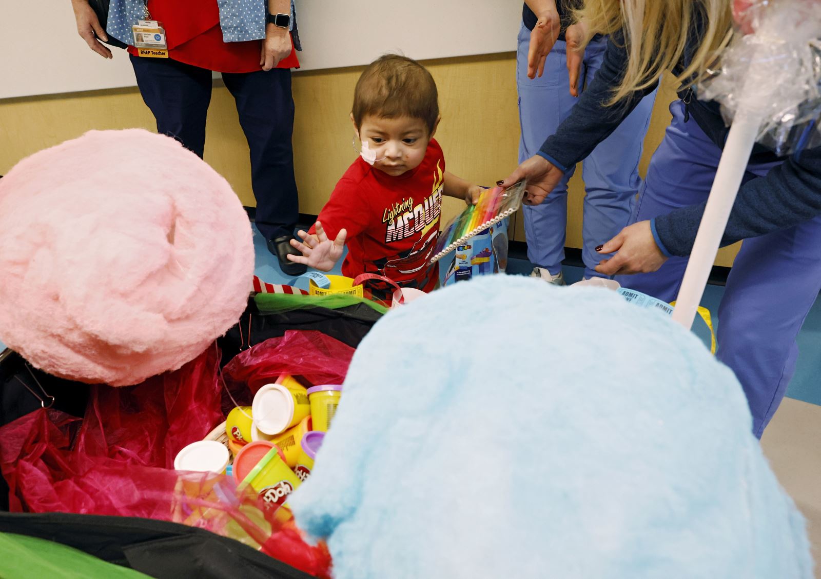patient gets to pick some goodies out of Thanksgiving parade float