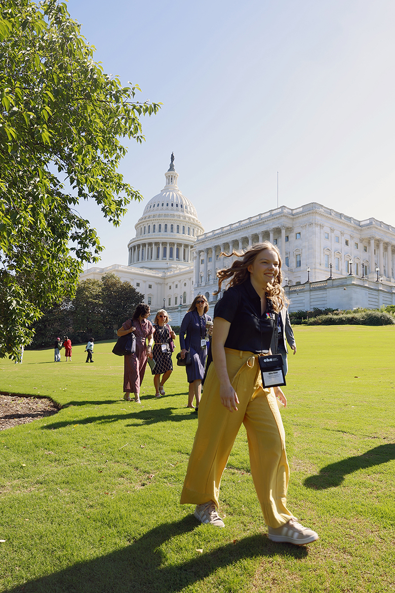 CHoR patient Riley walks in front of the Capitol building on her way to visit legislators