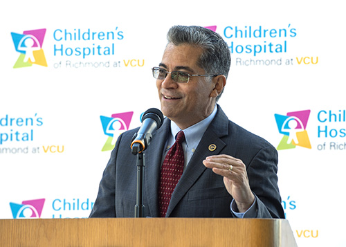 U.S. Secretary of Health and Human Services Xavier Becerra speaks to the media during a visit to Children's Hospital of Richmond at VCU