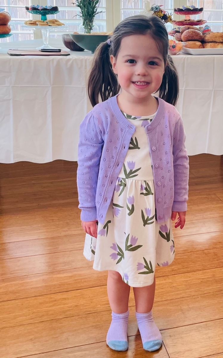 CHoR NICU graduate Ada in a flowered dress
