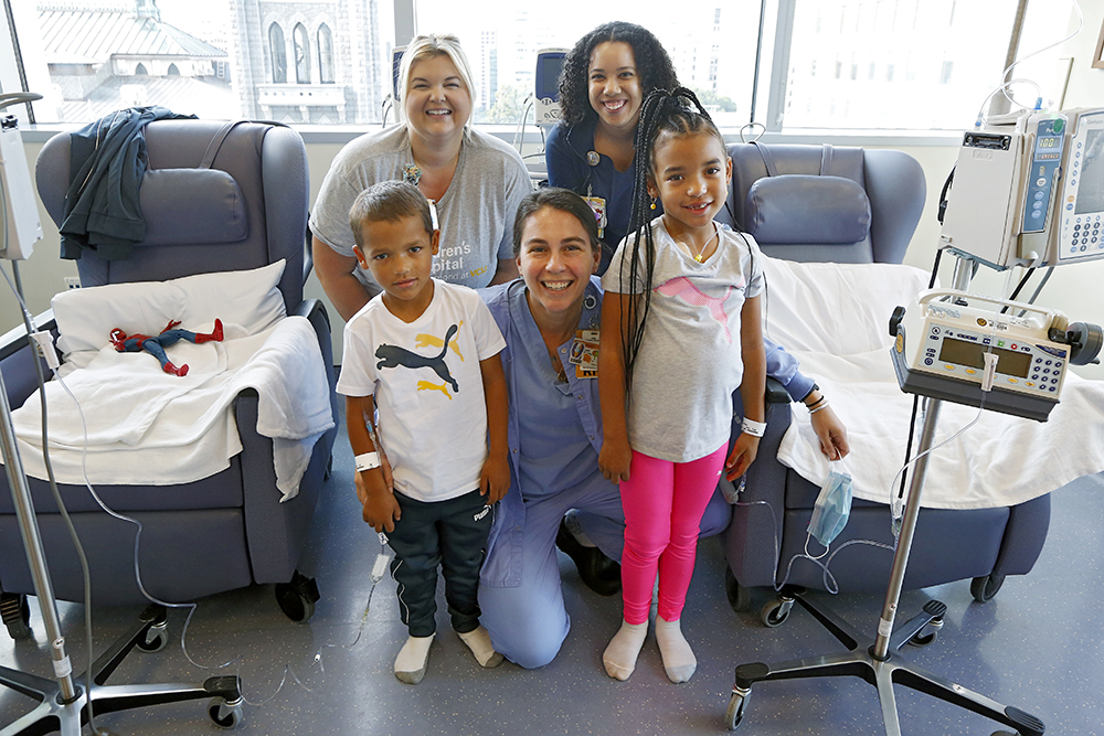 Evan and Leah and their team in the infusion center at CHoR