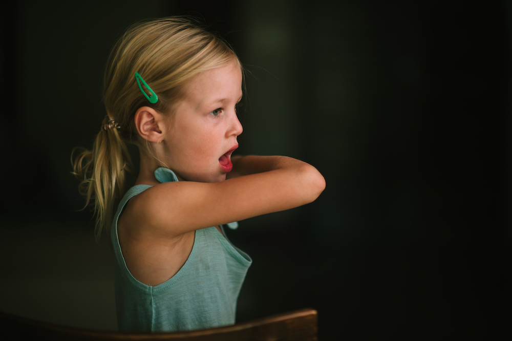 girl coughing