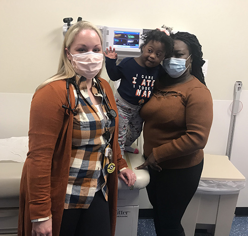 Jahziah with pediatric doctor and mom