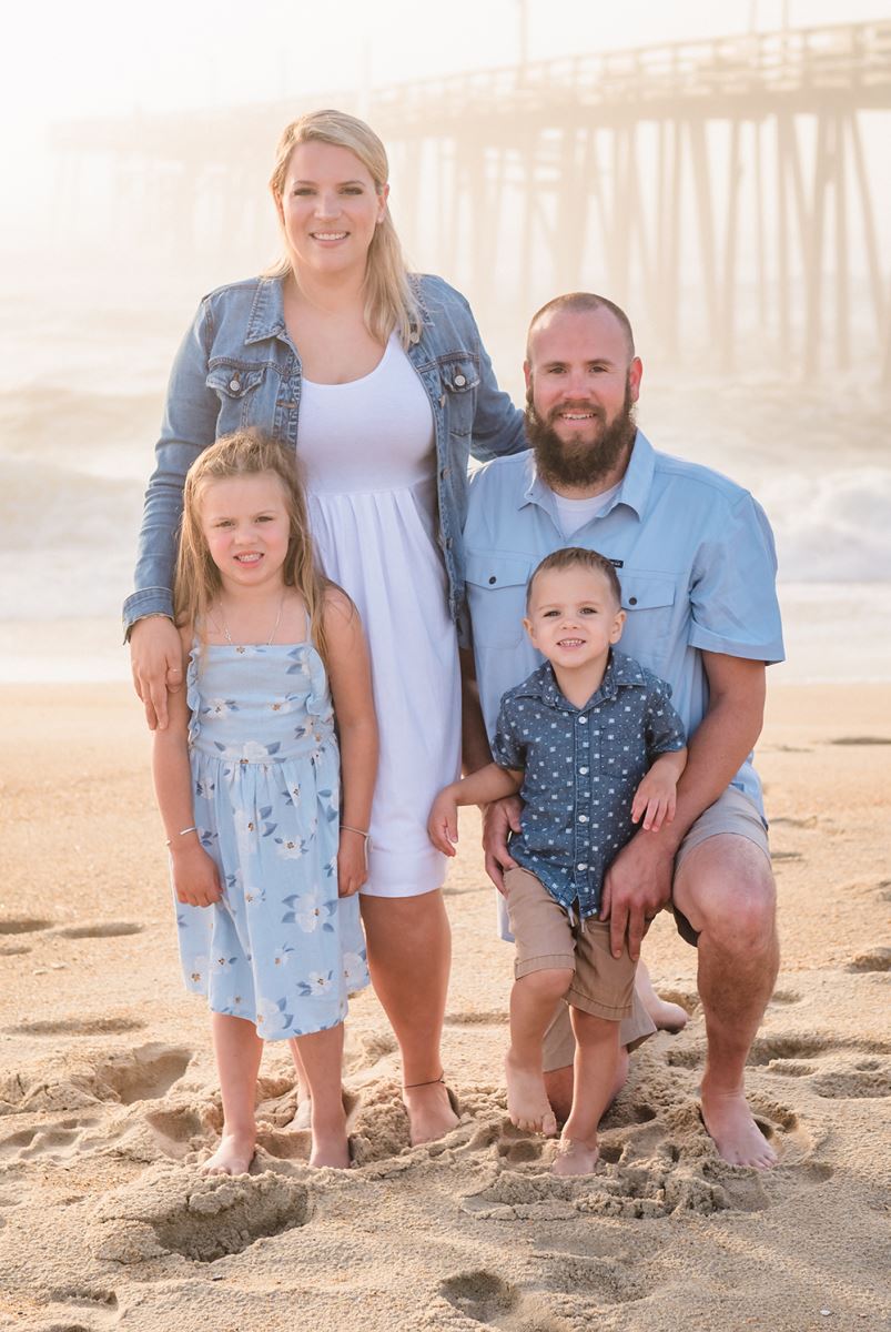 CHoR nurse Jenna Davis with her husband and two children on the beach