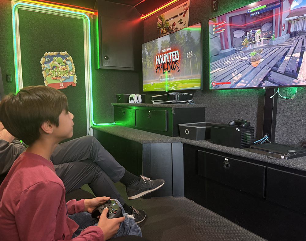 CHoR patient Jonah Smith playing a video game