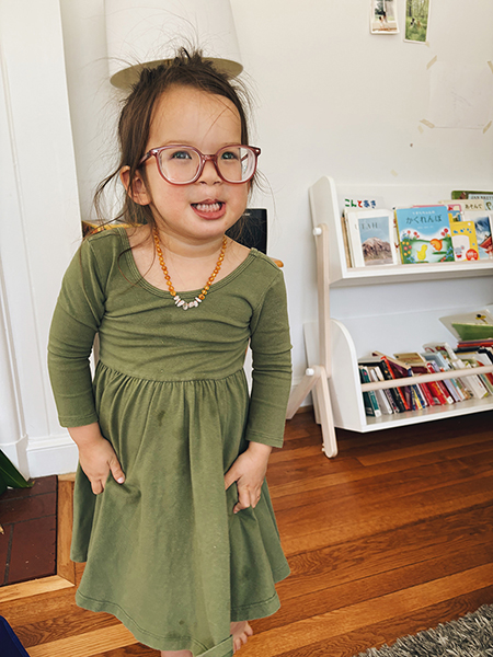 CHoR calendar kid June smiles in her new glasses