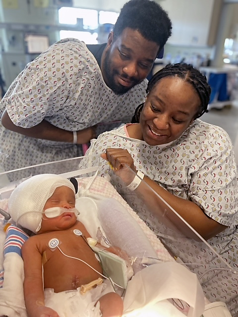 CHoR patient Kamryn with her parents in the hospital