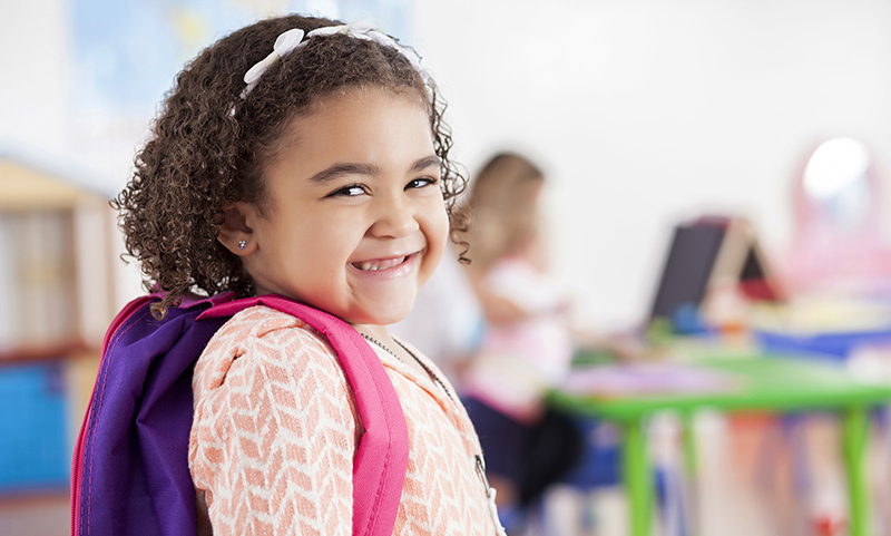 Excited Little Girl On The First Day Of Preschool