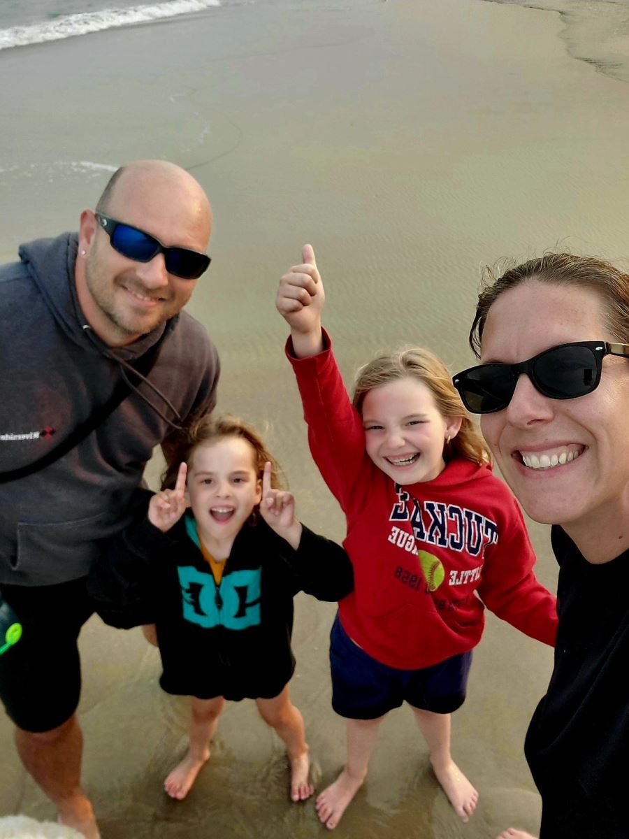CHoR patient Maria with her parents and sister on the beach