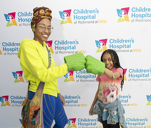 Patient and caregiver enjoy Markel carnival at CHoR