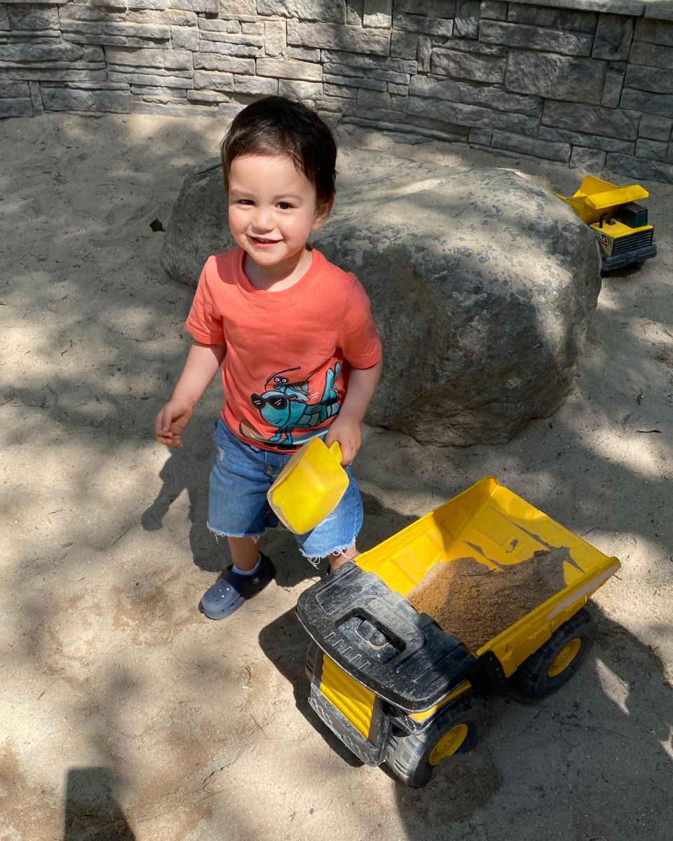 CHoR patient Nico playing with trucks