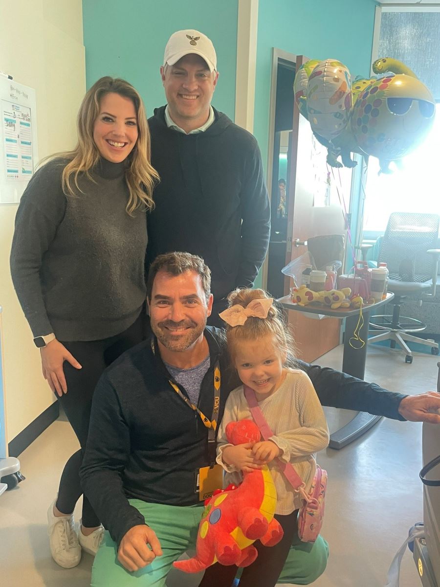 CHoR patient Olivia Rudesheim and her parents with Dr. Brian Kogon