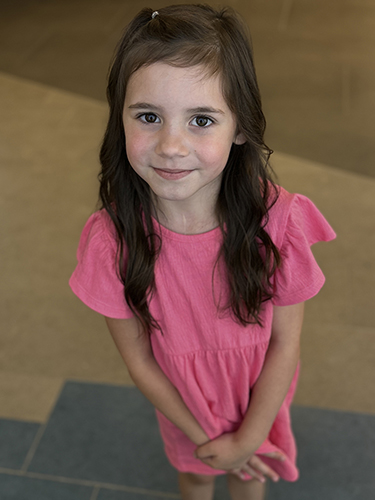CHoR patient Quinn in a pink dress