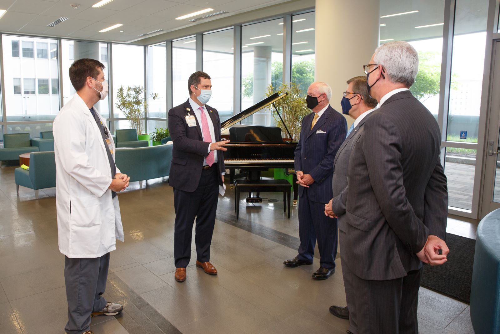 CHoR's Elias Neujahr and Dr. Frank Petruzella talk with TowneBank executives